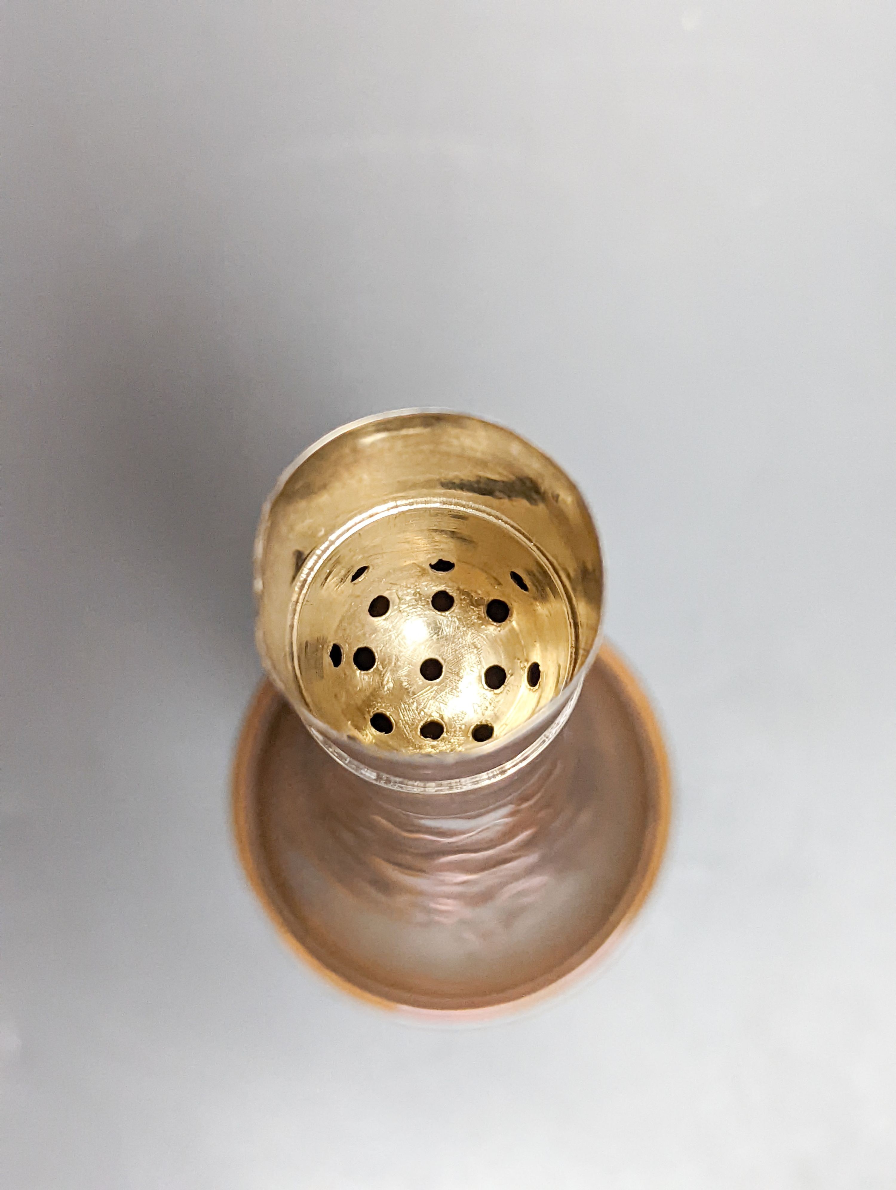 A copper plated silver base by Charles and Richard Comyns, London 1924, a large silver-mounted wine cooler and a glass jug